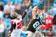 Case in point—Greg Olsen comes down with the football more often than not.