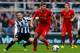 NEWCASTLE-UPON-TYNE, ENGLAND - OCTOBER 19: Yohan Cabaye (L) of Newcastle in action with Steven Gerrard of Liverpool during the Barclays Premier League match between Newcastle United and Liverpool at St James' Park on October 19, 2013 in Newcastle-Upon-Tyn