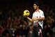 LONDON, ENGLAND - NOVEMBER 02: Luis Suarez of Liverpool prepares to take a throw in during the Barclays Premier League match between Arsenal and Liverpool at Emirates Stadium on November 2, 2013 in London, England. (Photo by Laurence Griffiths/Getty Ima