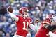 Nov 3, 2013; Orchard Park, NY, USA; Kansas City Chiefs quarterback Alex Smith (11) passes under pressure from Buffalo Bills defensive tackle Kyle Williams (95) during the second half at Ralph Wilson Stadium. Chiefs beat the Bills 23-13. Mandatory Credit: