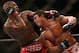 September 22, 2012; Toronto, ON, CANADA; Jon Jones (left) fights Vitor Belfort in the light heavyweight championship during UFC 152 at the Air Canada Centre. Mandatory Credit: Tom Szczerbowski-USA TODAY Sports
