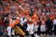 Oct 27, 2013; Denver, CO, USA; Denver Broncos quarterback Peyton Manning (18) passes in the fourth quarter against the Washington Redskins at Sports Authority Field at Mile High. Mandatory Credit: Ron Chenoy-USA TODAY Sports