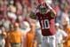 Oct 26, 2013; Tuscaloosa, AL, USA; Alabama Crimson Tide quarterback A.J. McCarron (10) calls off defense at the line against the Tennessee Volunteers during the first quarter at Bryant-Denny Stadium. Mandatory Credit: John David Mercer-USA TODAY Sports