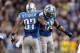 DETROIT, MI - OCTOBER 27: Calvin Johnson #81 of the Detroit Lions celebrates a fourth quarter touchdown by Matthew Stafford #9 with Brandon Pettigrew #87 while playing the Dallas Cowboys at Ford Field on October 27, 2013 in Detroit, Michigan. Detroit won