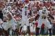 Oct 26, 2013; Tampa, FL, USA; Louisville Cardinals quarterback Teddy Bridgewater (5) throws the ball for a touchdown against the South Florida Bulls during the first quarter at Raymond James Stadium. Mandatory Credit: Kim Klement-USA TODAY Sports