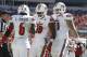 Oct 26, 2013; Tampa, FL, USA; Louisville Cardinals running back Dominique Brown (10) is congratulated by wide receiver Eli Rogers (6) and Louisville Cardinals offensive linesman Chris Acosta (71)after he scored a touchdown against the South Florida Bulls