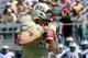 ORLANDO, FL - OCTOBER 26: J.J. Worton #9 of the UCF Knights attempts a pass during the game against the Connecticut Huskies at Bright House Networks Stadium on October 26, 2013 in Orlando, Florida. (Photo by Sam Greenwood/Getty Images)