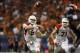 Sep 28, 2013; San Antonio, TX, USA; Houston Cougars quarterback John O'Korn (5) throws the ball during the first half against the Texas-San Antonio Roadrunners at Alamodome. Mandatory Credit: Soobum Im-USA TODAY Sports