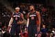 AUBURN HILLS, MI - NOVEMBER 3: Josh Smith #6 talks to Greg Monroe #10 of the Detroit Pistons against the Boston Celtics during the game on November 3, 2013 at The Palace of Auburn Hills in Auburn Hills, Michigan. NOTE TO USER: User expressly acknowledges