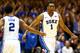 DURHAM, NC - NOVEMBER 08: Jabari Parker #1 of the Duke Blue Devils celebrates with teammate Quinn Cook #2 after a dunk against the Davidson Wildcats during their game at Cameron Indoor Stadium on November 8, 2013 in Durham, North Carolina. (Photo by Str