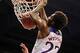 Oct 29, 2013; Lawrence, KS, USA; Kansas Jayhawks guard Andrew Wiggins (22) dunks the ball and is fouled by Pittsburg State Gorillas forward Alex Williams (23) during the first half at Allen Fieldhouse. Mandatory Credit: Denny Medley-USA TODAY Sports