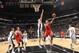 SAN ANTONIO, TX - OCTOBER 24: Jeremy Lin #7 of the Houston Rockets goes to the basket against Aron Baynes #16 of the San Antonio Spurs during the last preseason game at the AT&T Center on October 24, 2013 in San Antonio, Texas. NOTE TO USER: User expressl