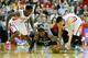 HOUSTON, TX - APRIL 12: Patrick Beverley #12 and Jeremy Lin #7 of the Houston Rockets battle for a loose ball with Mike Conley #11 of the Memphis Grizzlies at the Toyota Center on April 12, 2013 in Houston, Texas. NOTE TO USER: User expressly acknowledge