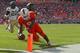 MIAMI GARDENS, FL - OCTOBER 26: Duke Johnson #8 of the Miami Hurricanes dives for the pylon during a game against the Wake Forest Demon Deacons at Sun Life Stadium on October 26, 2013 in Miami Gardens, Florida. (Photo by Mike Ehrmann/Getty Images)