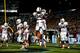 CHAPEL HILL, NC - OCTOBER 17: Dallas Crawford #25 of the Miami Hurricanes celebrates after scoring a touchdown against the North Carolina Tar Heels during their game at Kenan Stadium on October 17, 2013 in Chapel Hill, North Carolina. (Photo by Streeter