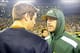Nov 4, 2013; Green Bay, WI, USA; Green Bay Packers quarterback Aaron Rodgers (right) talks to Chicago Bears quarterback Jay Cutler (left) after the Bears beat the Packers 27-20 at Lambeau Field. Rodgers left the game early in the 1st quarter with a left