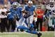 DETROIT, MI - OCTOBER 27: Calvin Johnson #81 of the Detroit Lions runs for extra yards after a third quarter catch while playing the Dallas Cowboys at Ford Field on October 27, 2013 in Detroit, Michigan. Detroit won the game 31-30. (Photo by Gregory Shamu