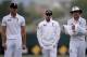 HOBART, AUSTRALIA - NOVEMBER 09: England fast bowlers Chris Tremlett, James Anderson and Stuart Broad leave the field for a rain break during day four of the tour match between Australia A and England at Blundstone Arena on November 9, 2013 in Hobart, Au