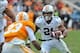 Nov 9, 2013; Knoxville, TN, USA; Auburn Tigers running back Tre Mason (21) rushes against Tennessee Volunteers defensive back Cameron Sutton (23) during the second half at Neyland Stadium. Auburn won 55-23. Mandatory Credit: Jim Brown-USA TODAY Sports