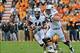 Nov 9, 2013; Knoxville, TN, USA; Auburn Tigers offensive linesman Alex Kozan (63) gets set to block for Auburn quarterback Nick Marshall (14) as he rushes away from Tennessee Volunteers defensive back JaRon Toney (35) during the second half at Neyland Sta
