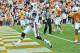 Nov 9, 2013; Knoxville, TN, USA; Auburn Tigers quarterback Nick Marshall (14) scores a touchdown against the Tennessee Volunteers during the first half at Neyland Stadium. Mandatory Credit: Jim Brown-USA TODAY Sports