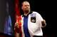 LONDON, ENGLAND - DECEMBER 30: Raymond van Barneveld of the Netherlands celebrates winning a set during his semi final match against Phil Taylor of England on day fourteen of the 2013 Ladbrokes.com World Darts Championship at the Alexandra Palace on Decem
