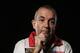 SYDNEY, AUSTRALIA - AUGUST 29: (EDITORS NOTE: Image has been desaturated) Phil Taylor poses for a portrait ahead of the Sydney Darts Masters at Luna Park on August 29, 2013 in Sydney, Australia. (Photo by Mark Metcalfe/Getty Images)
