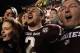 COLLEGE STATION, TX - NOVEMBER 09: Johnny Manziel #2 of the Texas A&M Aggies celebrates with fans after the Aggies defeated the Mississippi State Bulldogs 51-41 at Kyle Field on November 9, 2013 in College Station, Texas. (Photo by Scott Halleran/Getty