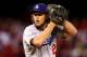 ST LOUIS, MO - OCTOBER 18: Clayton Kershaw #22 of the Los Angeles Dodgers pitches in the first inning against the St. Louis Cardinals in Game Six of the National League Championship Series at Busch Stadium on October 18, 2013 in St Louis, Missouri. (Pho
