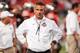 COLUMBUS, OH - SEPTEMBER 28: Head Coach Urban Meyer of the Ohio State Buckeyes watches his team warm up before a game against the Wisconsin Badgers at Ohio Stadium on September 28, 2013 in Columbus, Ohio. (Photo by Jamie Sabau/Getty Images)