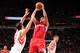 HOUSTON, TX - NOVEMBER 9: Jared Dudley #9 of the Los Angeles Clippers shoots the ball against Omri Casspi #18 of the Houston Rockets on November 9, 2013 at the Toyota Center in Houston, Texas. NOTE TO USER: User expressly acknowledges and agrees that, by