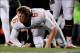 Nov 9, 2013; Morgantown, WV, USA; Texas Longhorns quarterback Case McCoy (6) looks for his helmet in the second quarter against the West Virginia Mountaineers at Milan Puskar Stadium. Mandatory Credit: Evan Habeeb-USA TODAY Sports