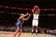 NEW YORK, NY - OCTOBER 25: Iman Shumpert #21 of the New York Knicks shoots during a preseason game against the Charlotte Bobcats on October 25, 2013 at Madison Square Garden in New York City. NOTE TO USER: User expressly acknowledges and agrees that, by
