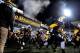 Nov 9, 2013; Morgantown, WV, USA; West Virginia Mountaineers players run onto the field prior to the game against the Texas Longhorns at Milan Puskar Stadium. Mandatory Credit: Evan Habeeb-USA TODAY Sports