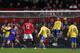 MANCHESTER, ENGLAND - NOVEMBER 10: Robin van Persie of Manchester United (not pictured) scores the opening goal past Wojciech Szczesny of Arsenal during the Barclays Premier League match between Manchester United and Arsenal at Old Trafford on November 1