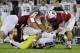 PALO ALTO, CA - NOVEMBER 07: Marcus Mariota #8 of the Oregon Ducks fumbles the ball as he is tackled by David Parry #58, A.J. Tarpley #17 and Jarek Lancaster #35 of the Stanford Cardinal at Stanford Stadium on November 7, 2013 in Palo Alto, California.