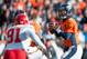 DENVER, CO - DECEMBER 30: Quarterback Peyton Manning #18 of the Denver Broncos scans for an open receiver against the Kansas City Chiefs during a game at Sports Authority Field Field at Mile High on December 30, 2012 in Denver, Colorado. (Photo by Dusti