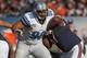 CHICAGO, IL - NOVEMBER 10: Ndamukong Suh #90 of the Detroit Lions rushes against Jordan Mills #67 of the Chicago Bears at Soldier Field on November 10, 2013 in Chicago, Illinois. (Photo by Jonathan Daniel/Getty Images)