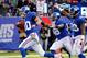 Nov 10, 2013; East Rutherford, NJ, USA; New York Giants safety Cooper Taylor (30) runs in blocked punt for touchdown during the first half against the Oakland Raiders at MetLife Stadium. Mandatory Credit: Jim O'Connor-USA TODAY Sports
