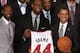 WASHINGTON, DC - JANUARY 28: U.S. President Barack Obama (R) stands with Miami Heat players, including Dwyane Wade (L), LeBron James (2nd-L), Mario Chalmers (2R) during an event to honor the NBA champion Miami Heat in the East Room at the White House on J