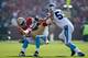 SAN FRANCISCO, CA - NOVEMBER 10: Mario Manningham #82 of the San Francisco 49ers is tackled by Captain Munnerlyn #41 and Luke Kuechly #59 of the Carolina Panthers at Candlestick Park on November 10, 2013 in San Francisco, California. (Photo by Ezra Shaw