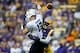 Oct 26, 2013; Baton Rouge, LA, USA; LSU Tigers cornerback Dwayne Thomas (13) hits Furman Paladins quarterback Reese Hannon (12) as he throws to cause an incomplete pass during the first quarter of a game at Tiger Stadium. Mandatory Credit: Derick E. Hingl
