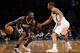 NEW YORK, NY - NOVEMBER 09: Lance Stephenson #1 of the Indiana Pacers drives against Alan Anderson #6 of the Brooklyn Nets during the second half at Barclays Center on November 9, 2013 in the Brooklyn borough of New York City. The Pacers defeat the Nets