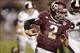 Nov 9, 2013; College Station, TX, USA; Texas A&M Aggies quarterback Johnny Manziel (2) scrambles against the Mississippi State Bulldogs during the second half at Kyle Field. Texas A&M won 51-41. Mandatory Credit: Thomas Campbell-USA TODAY Sports