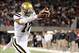 Nov 9, 2013; Tucson, AZ, USA; UCLA Bruins quarterback Brett Hundley (17) runs the ball for a touchdown during the first quarter against the Arizona Wildcats at Arizona Stadium. Mandatory Credit: Casey Sapio-USA TODAY Sports