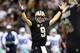 NEW ORLEANS, LA - NOVEMBER 10: Quarterback Drew Brees #9 of the New Orleans Saints celebrates against the Dallas Cowboys during a game at the Mercedes-Benz Superdome on November 10, 2013 in New Orleans, Louisiana. (Photo by Ronald Martinez/Getty Images)