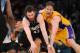 LOS ANGELES, CA - MARCH 16: Kevin Love #42 of the Minnesota Timberwolves and Pau Gasol #16 of the Los Angeles Lakers chase after a loose ball during their game at Staples Center on March 16, 2012 in Los Angeles, California. NOTE TO USER: User expressly a
