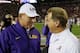 Nick Saban and Les Miles exchange pleasantries before Saturday night's game.