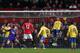 MANCHESTER, ENGLAND - NOVEMBER 10: Robin van Persie of Manchester United (not pictured) scores the opening goal past Wojciech Szczesny of Arsenal during the Barclays Premier League match between Manchester United and Arsenal at Old Trafford on November 1