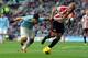 SUNDERLAND, ENGLAND - NOVEMBER 10: Wes Brown of Sunderland in action with Sergio Aguero of Manchester City during the Barclays Premier League match between Sunderland and Manchester City at Stadium of Light on November 10, 2013 in Sunderland, England. (Ph